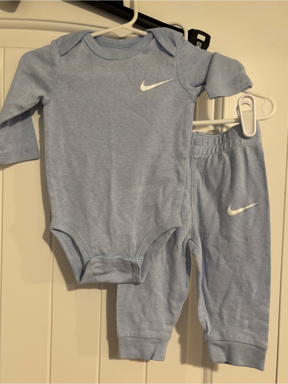 Nike Light Blue Infant Bodysuit and Pants Set with White Swoosh